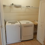 Washer and Dryer in Hallway Closet with Utility Sink - Lewes Vacation Rental