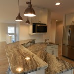 Kitchen peninsula with pendant lights -lewes delaware vacation home rental rehoboth